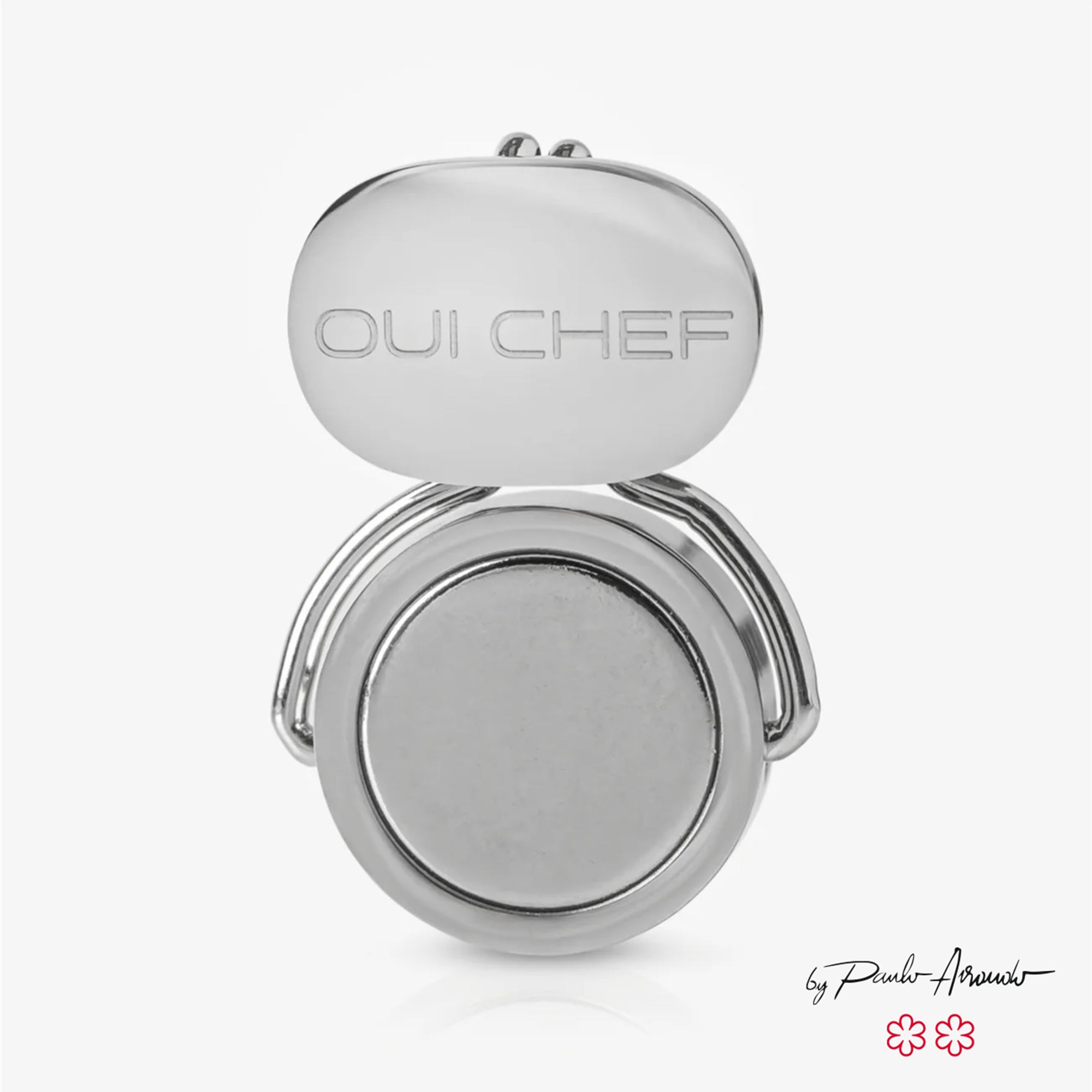 Stainless steel magnetic clip with 'OUI CHEF' branding on a white background