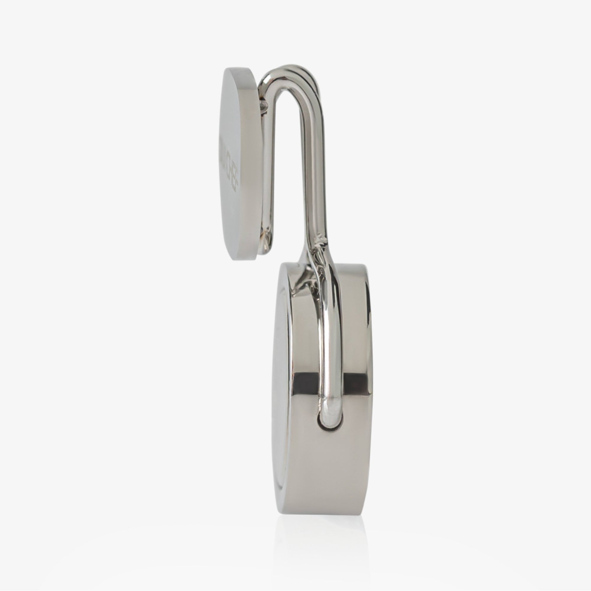Side profile of a stainless steel magnetic clip with 'OUI CHEF' branding on a white background